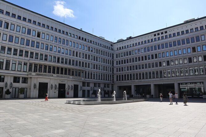 Life Behind the Iron Curtain Warsaw Walking Tour - Constitution Square: the “new center” that tells a whole story