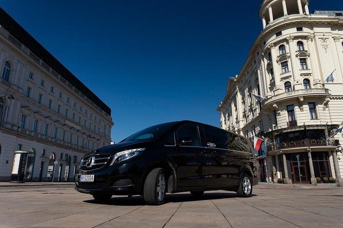 Luxury Warsaw Chopin Airport Transfer by private Minivan car - Inside the Mercedes-Style Comfort: Air-Con, Water, and Internet