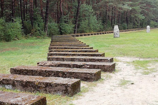Private half-day tour to Treblinka with hotel pickup - Treblinka Memorial: the main gate, the railway ramp, and what remains