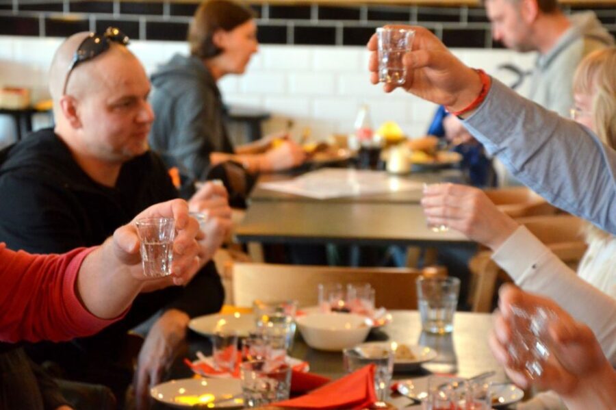 Warsaw: Private Vodka Tasting Night with Snacks and Pickup - Muranów District Finale: 1960s Bar Atmosphere and Snacks