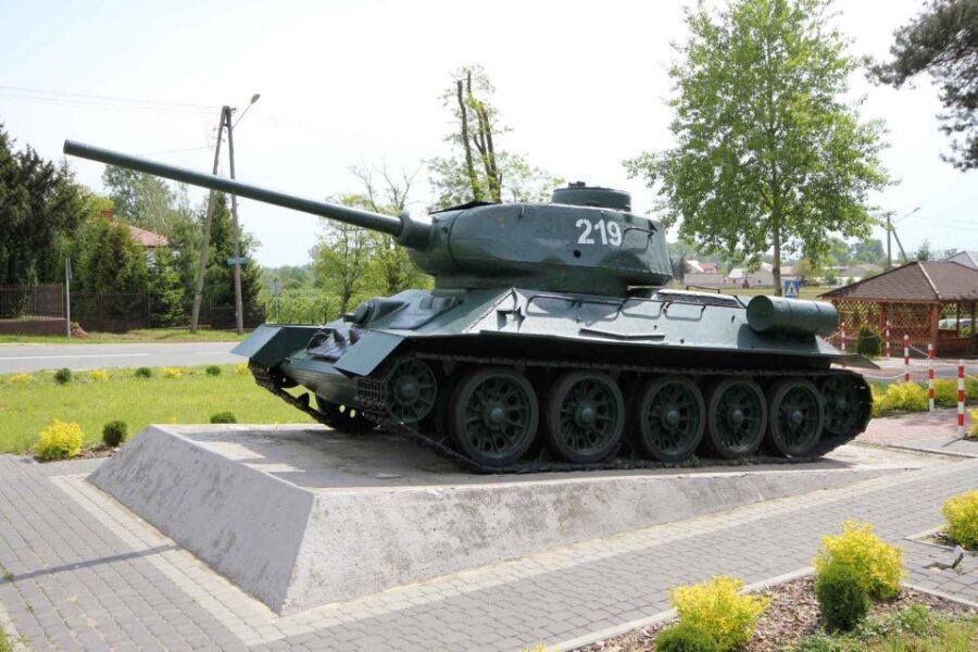 Warsaw: WWII Private Tour by Retro Minibus with Hotel Pickup - Soviet crimes in Warsaw: deportations, Katyń, and the monument site